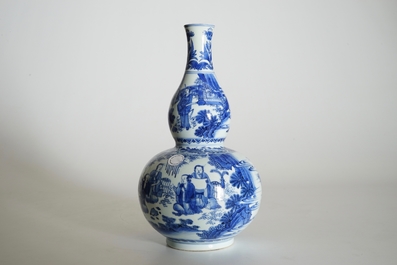 A Chinese blue and white double gourd vase with scholars, Transitional period, Chongzhen